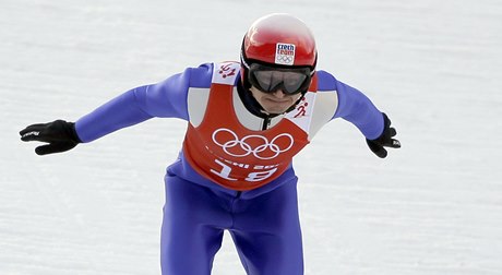 Pavel Churavý pi skokanské ásti olympijského závodu