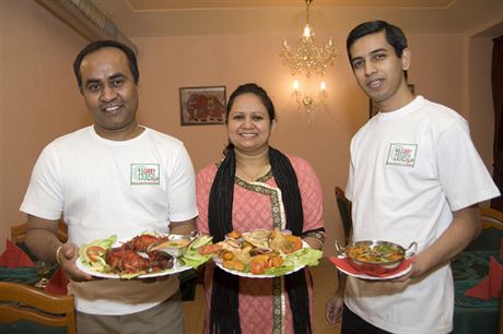 The Curry Houses Hassan Mamun with his wife and nephew, and some of their dishes