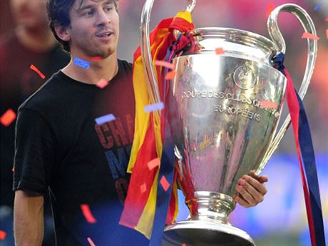 FC Barcelona Lionel Messi holds the the Champions League trophy as Barcelona celebrate beating Manchester United to win the Champions League soccer title on May 29 at the Camp Nou stadium in Barcelona city
