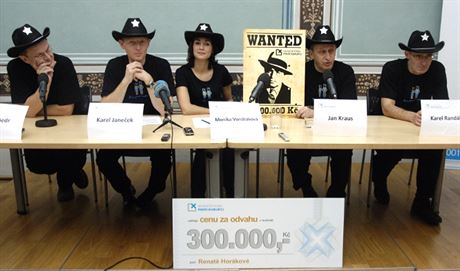 NFPK board members, including co-founders Karel Janeček (second from left) and Jan Kraus (second from right), explain the 'WANTED' initiative