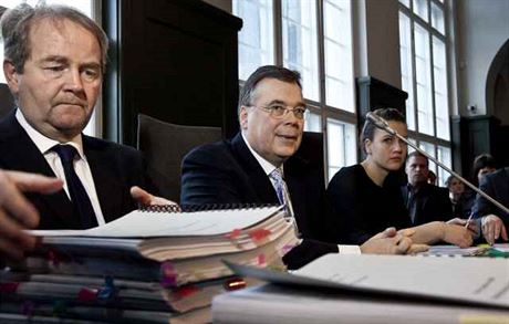 Former PM of Iceland Geir Haarde (center) in a Reykjavik court at the start of his trial on March 5. He is the first world leader to face criminal charges over the 2008 financial crisis that affected much of the world economy. Haarde became a symbol of t