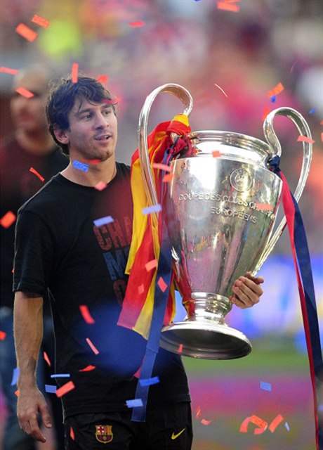 FC Barcelona Lionel Messi holds the the Champions League trophy as Barcelona celebrate beating Manchester United to win the Champions League soccer title on May 29 at the Camp Nou stadium in Barcelona city