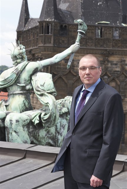 Governor Miroslav Singer on the roof of the Czech National Bank