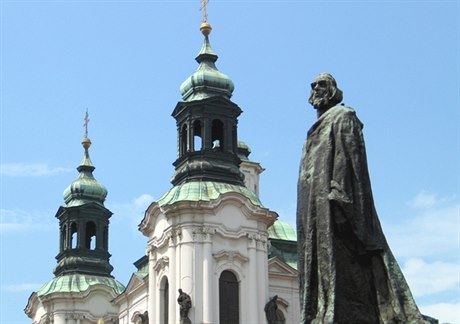Church restitution battle rooted in prejudices dating back hundreds of years, Czech culture minister says. Statue of reformer Jan Hus pictured in front of a Baroque church, often a symbol of the Catholic counterrevolution