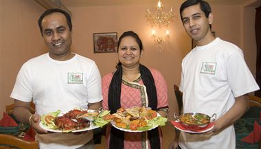 The Curry Houses Hassan Mamun with his wife and nephew, and some of their dishes