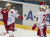 Zleva Jií Doleal a Pavel Klhfek z HC Slavia Praha se radují z gólu.