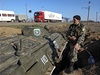 Ukrajinský voják na kontrolním stanoviti poblí msta Armjansk v Chersonské...