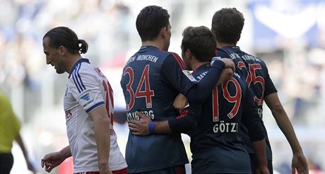 Zklamaný Petr Jiráek (vlevo) a radující se hrái Bayernu.