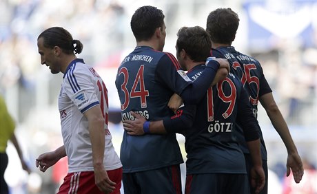 Zklamaný Petr Jiráek (vlevo) a radující se hrái Bayernu.