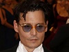 Johnny Depp se svou snoubenkou modelka Amber Heard.