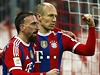 Radost fotbalist Bayernu. Franck Ribéry (vlevo) a Arjen Robben.