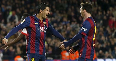 Luis Suárez (vlevo) a Lionel Messi.