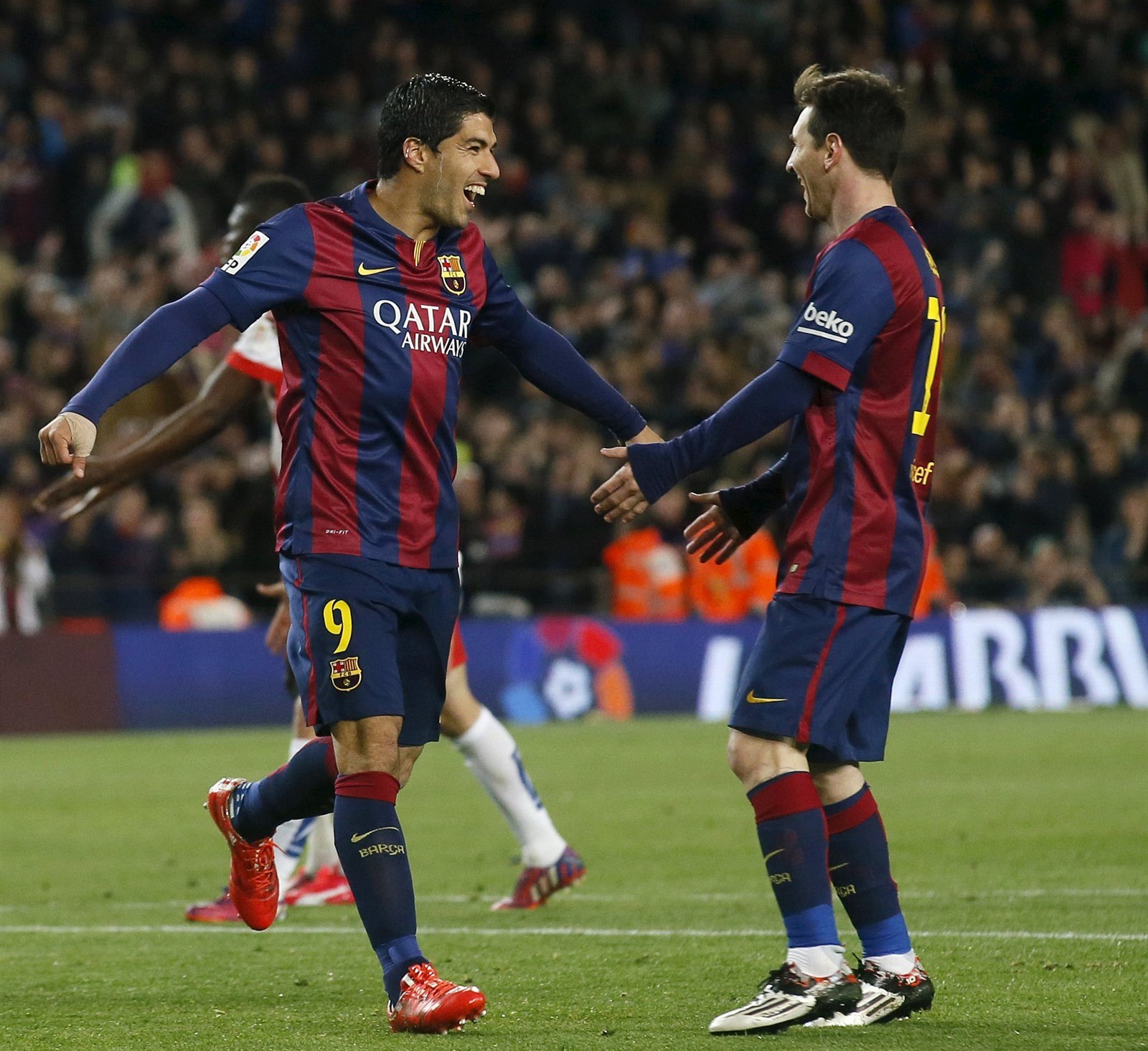 Luis Suárez (vlevo) a Lionel Messi.