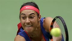 France's Caroline Garcia returns a ball to Czech Republic's Petra Kvitova...