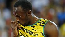 Vítězný polibek. Bolt vyhrál v čase 19,55.