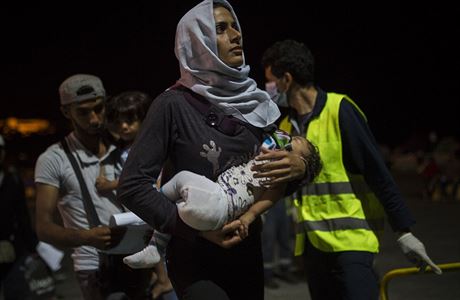 Syrská uprchlice s díttem.