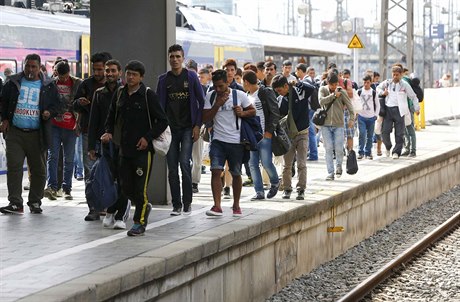 Migranti na nádraží v Mnichově.
