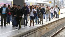 Migranti na ndra v Mnichov.