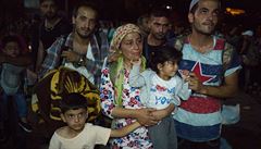 Rodina uprchlík ze Sýrie na ostrov Lesbos.