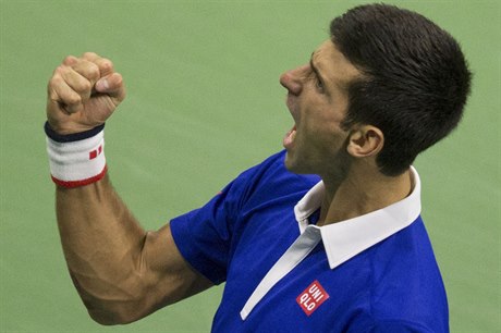 Srbský tenista Novak Djokovi slaví triumf na US Open.