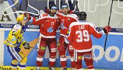Hokejisté Olomouce (zprava) Marek La, Jan Knotek a Dávid Buc se radují z gólu....