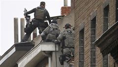 Belgická policie zasahuje ve tvrti Molenbeek.