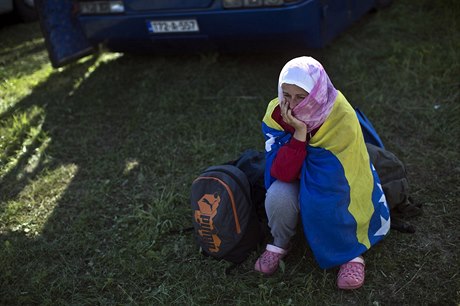 ekání. ena zahalená vlajkou Bosny a Hercegoviny (ilustraní snímek).