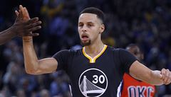 Golden State Warriors' Stephen Curry gets a high-five during the second half of...