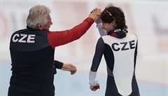 Martina Sablikova, of Czech Republic, celebrates with her coach Petr Novak...