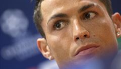 Real Madrid's Cristiano Ronaldo looks on during a press conference at the...