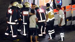 Paramedics help injured outside Turkey's largest airport, Istanbul Ataturk...