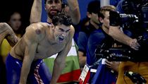 Michael Phelps se raduje z 19. olympijské medaile.