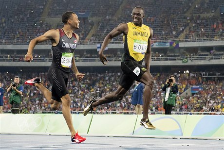 Andre De Grasse a Usain Bolt.