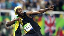 Usain Bolt a jeho typick gesto.