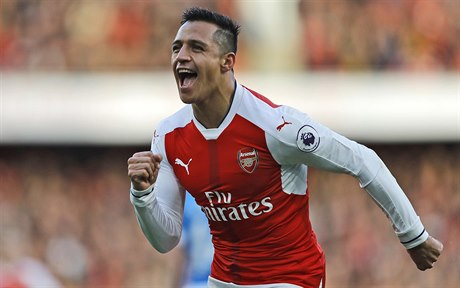 Arsenal's Alexis Sanchez celebrates after scoring during the English Premier...