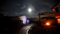 View of a street destroyed after heavy rains caused several rivers to overflow,...