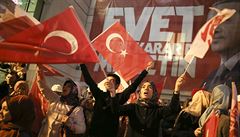 Supporters of Turkish President Tayyip Erdogan celebrate at the AK party...