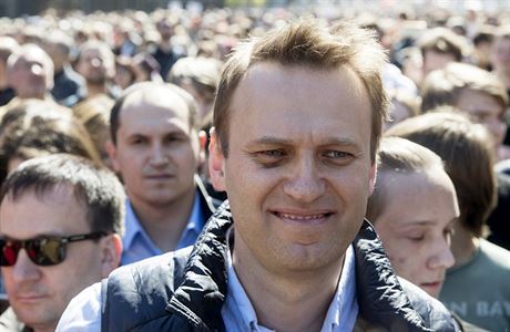 Russian opposition leader Alexei Navalny, center, takes part in a rally in...