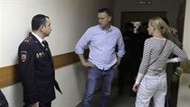Rusk opozin vdce Alexej Navalnyj (uprosted) a jeho manelka Julia ped...