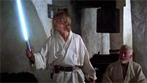 Luke Skywalker a jeho světelný meč.