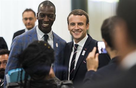 Francouzsk prezident Emmanuel Macron a bval americk sprinter Michael...