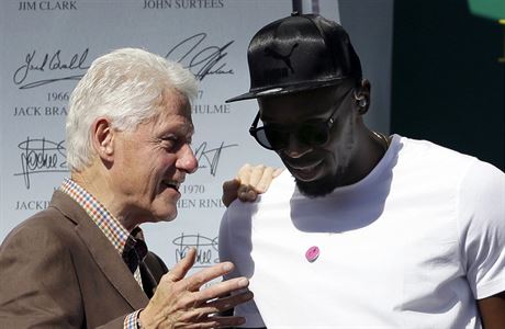 Bval americk prezident Bill Clinton si povd s Usainem Boltem.