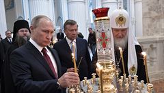 Russian Orthodox Church Patriarch Kirill, right, and Russian President Vladimir...
