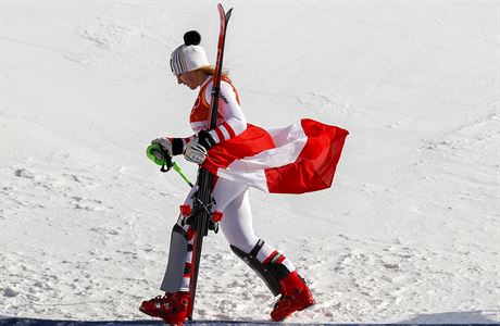 Bronze medal winnow Katharina Gallhuber, of Austria, walks off the podium after...