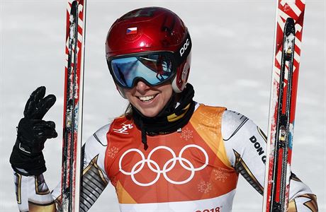 Czech Republic's Ester Ledecka smiles after competing in the women's super-G at...