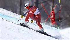 Norway's Aleksander Aamodt Kilde loses a ski stick after hitting a gate during...