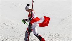 Bronze medal winnow Katharina Gallhuber, of Austria, walks off the podium after...
