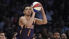 Phoenix Suns' Devin Booker shoots during the NBA basketball All-Star weekend...