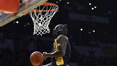 Indiana Pacers' Victor Oladipo dunks while wearing a mask from the movie "Black...