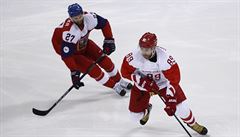 Nikita Nestrov (89) a Martin Rika bhem semifinále hokejového turnaje ZOH...